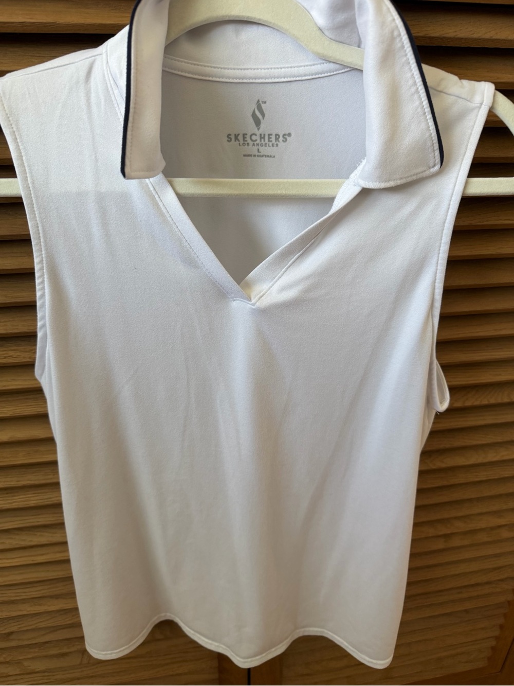 Skechers White Sleeveless Polo with Contrast Collar Trim